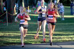 Ariana Madeira '29 and Charlotte Yanke '26 compete at States Cross Country meet