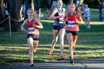 Ariana Madeira '29 and Charlotte Yanke '26 compete at States Cross Country meet