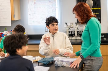 8th grade boy asks his science teacher a question