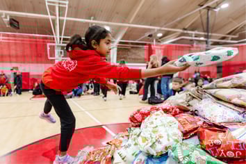 For the 10th year in a row, Friends Academy students wrapped holiday presents for a community-service endeavor to help people in the Bronx.