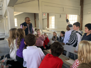 Ed Dugger and third grade in Matinecock Meeting House