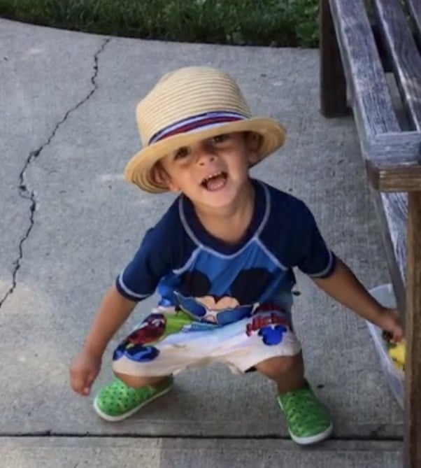 Little Friends camper with straw hat in summer