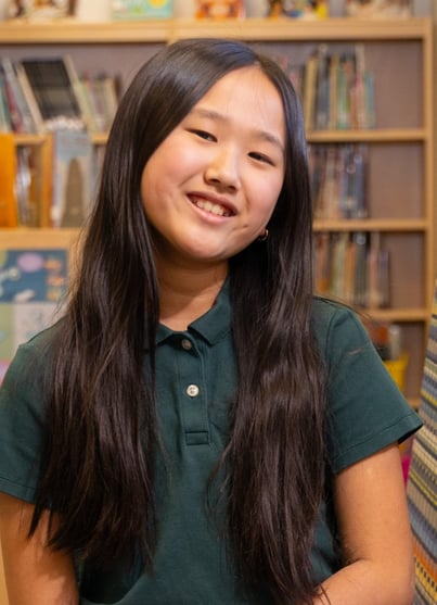 friends academy middle school girl in library