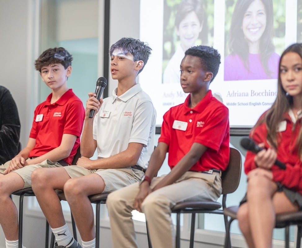 middle school students engaged in public speaking