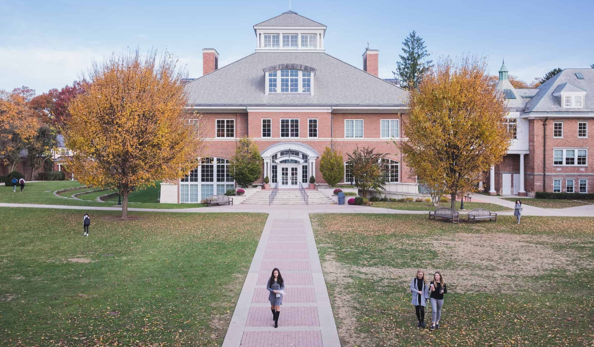 campus building drone aerial shot with fall foliage