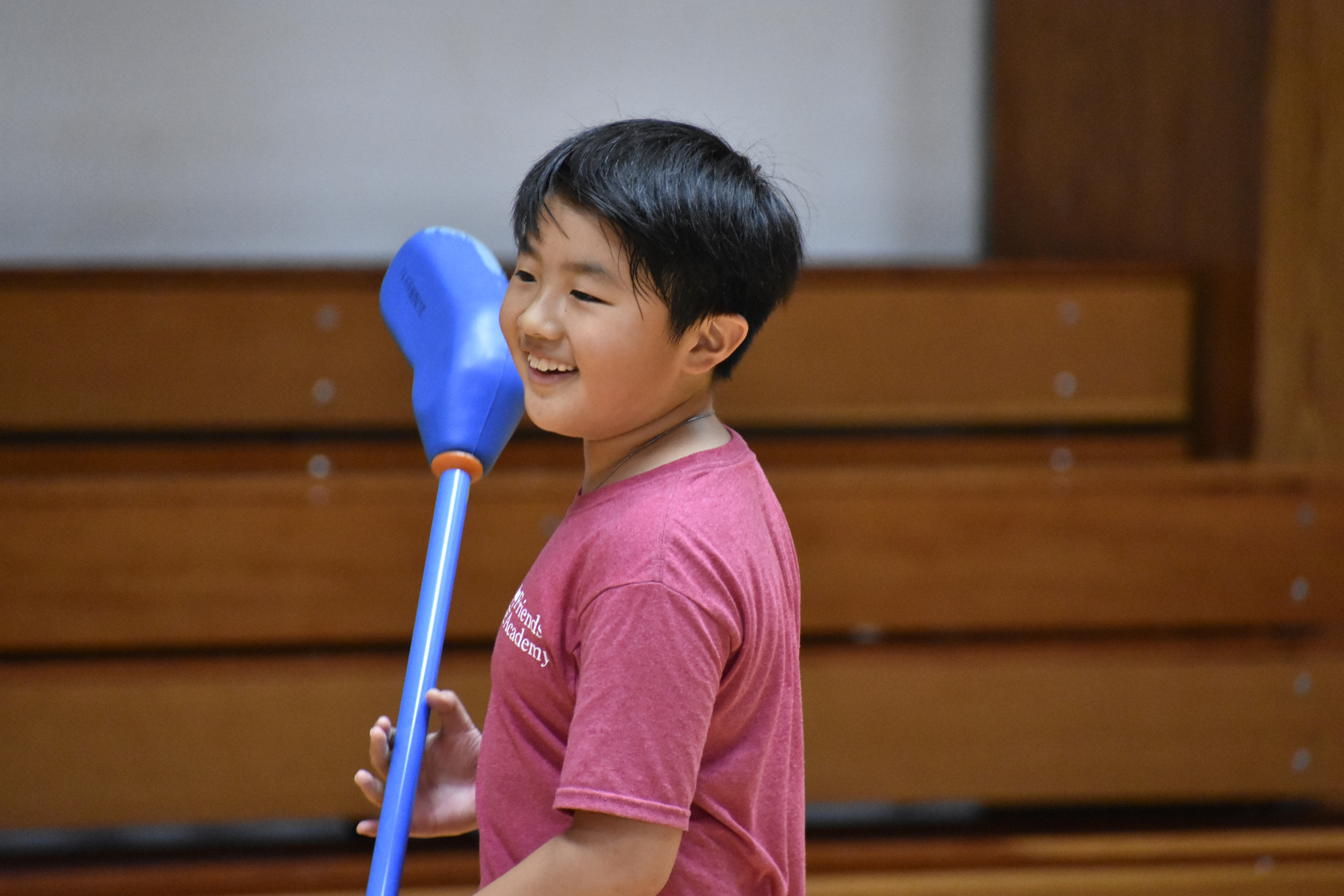 boy playing lacrosse