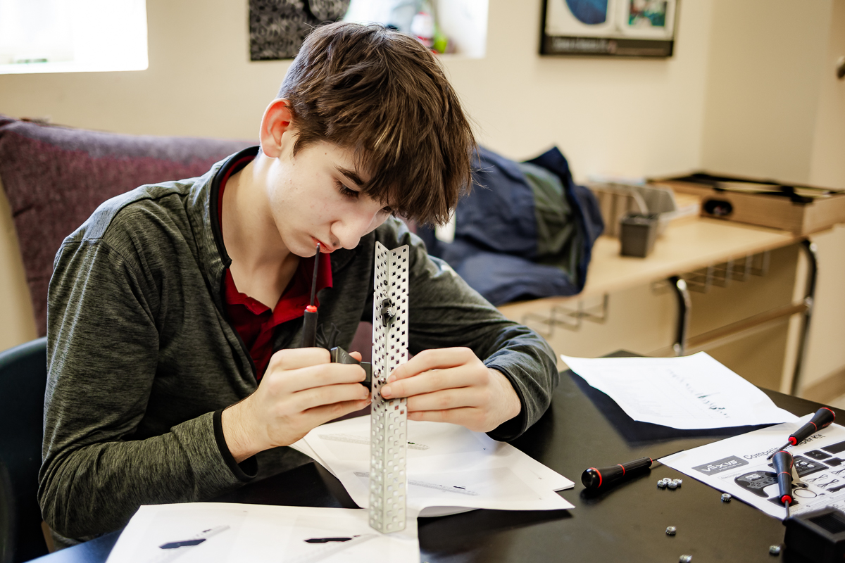 Upper School boy builds robot
