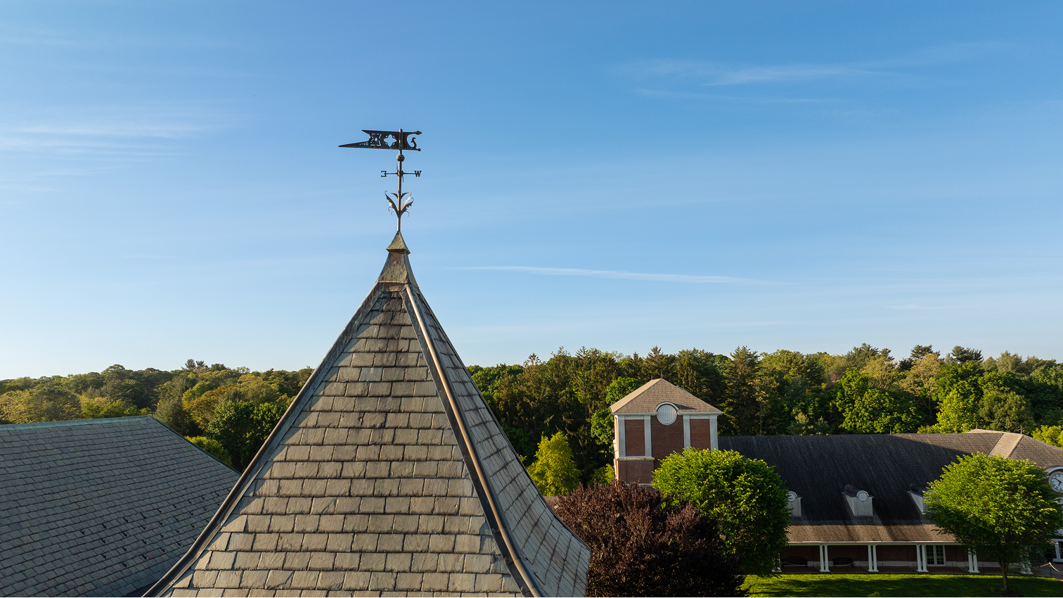 Weathervane on a Friends Academy building